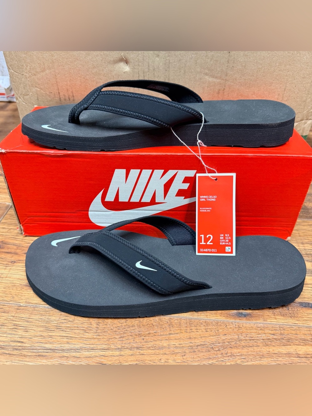 Nike Black Flip-Flop Sandals with White Swoosh